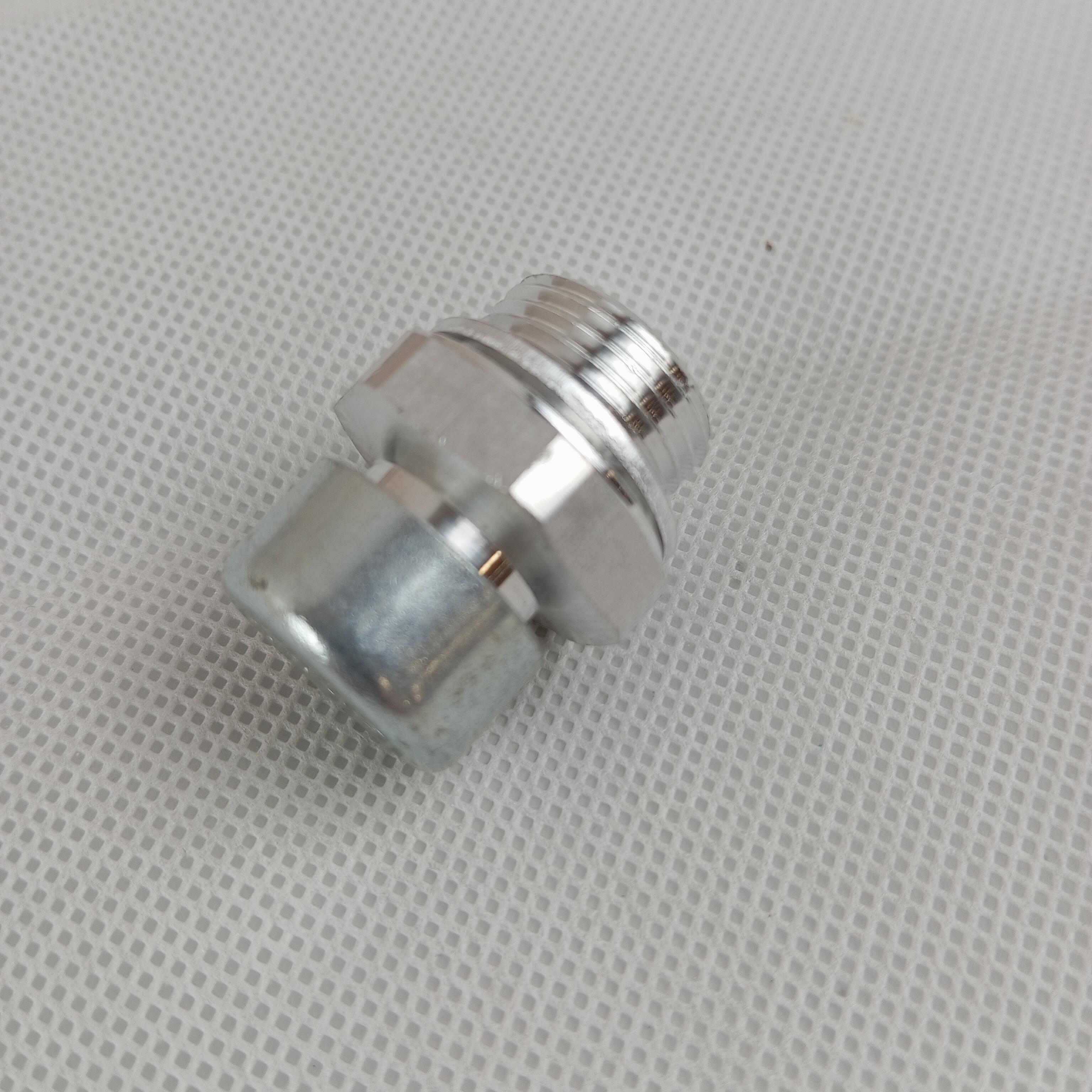 Filling plug with filter on top